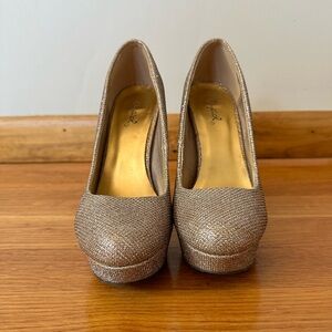 Golden height heels size 5.5 used a couple of times only